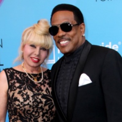 The husband and wife duo, Charlie Wilson and Mahie Wilson,  smiling at camera.